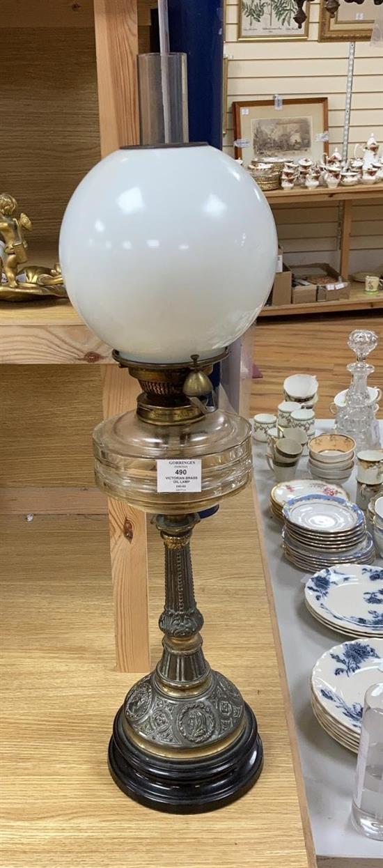 A Victorian brass oil lamp